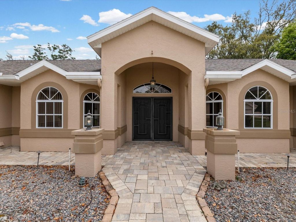 Photo of 18602 Winding Oaks Boulevard, Hudson, FL 34667 (MLS # TB8495825)