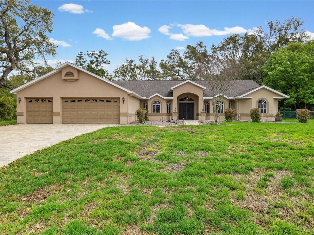 Photo of 18602 Winding Oaks Boulevard, Hudson, FL 34667 (MLS # TB8495825)