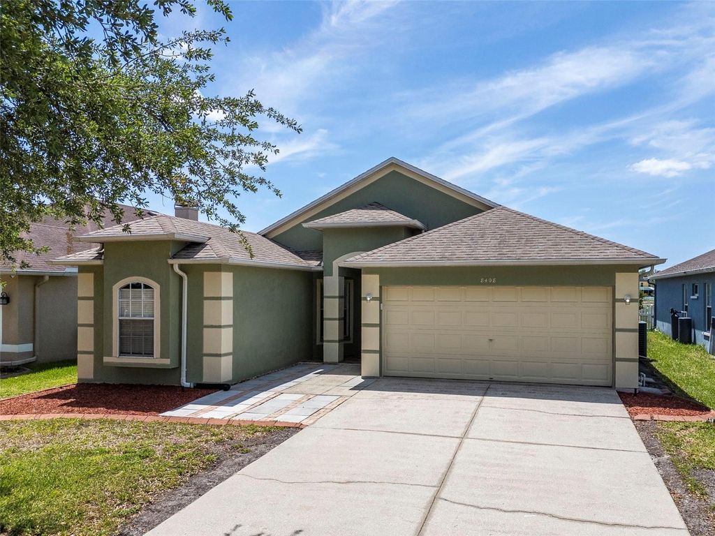 Photo of 8408 Canterbury Lake Boulevard, Tampa, FL 33619 (MLS # O6398946)