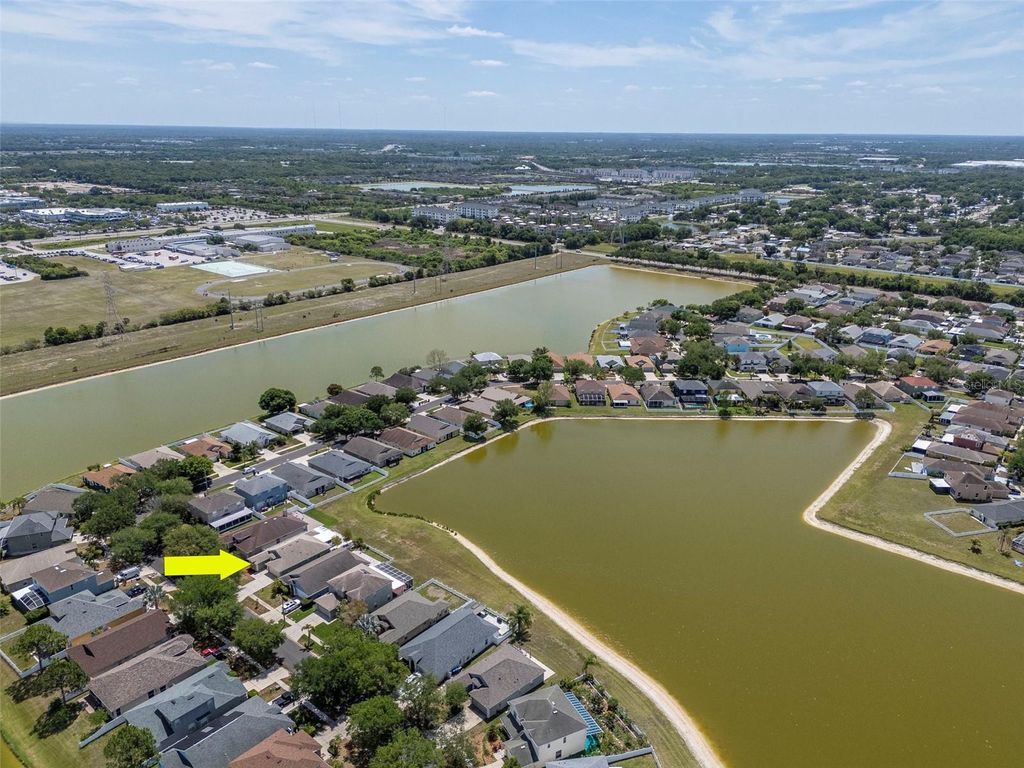 Photo of 8408 Canterbury Lake Boulevard, Tampa, FL 33619 (MLS # O6398946)