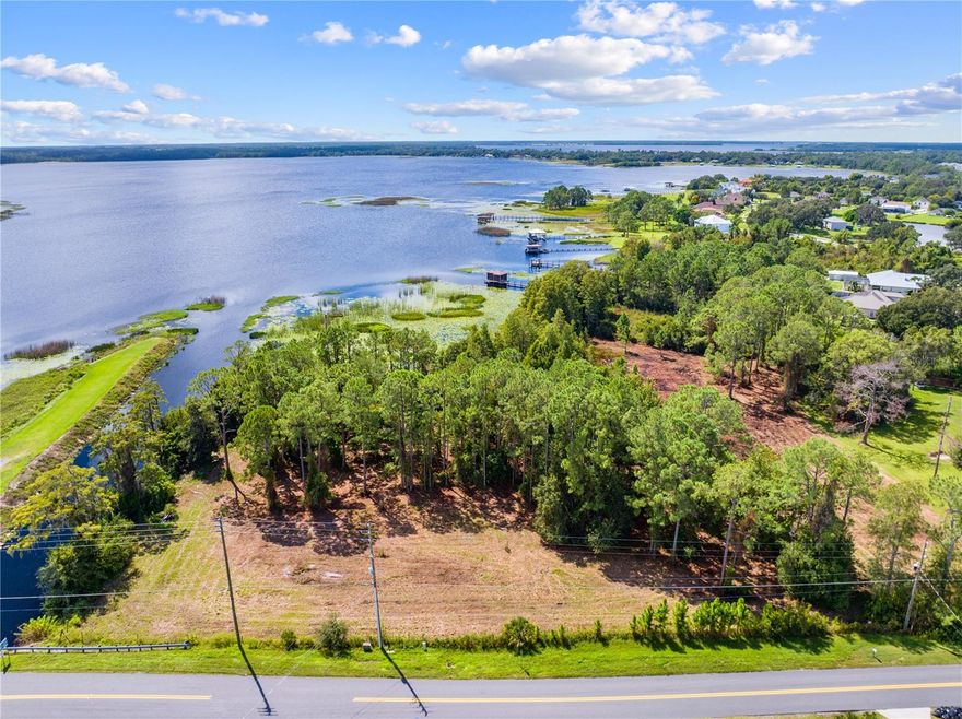 RARE WATERFRONT LAND OPPORTUNITY – 2.1 ACRES ON THE ALLIGATOR CHAIN OF LAKES! Discover a one-of-a-kind chance to own a vacant 2.1-acre waterfront lot with nearly 200+ feet of direct shoreline on stunning Lake Lizzie, part of the highly sought-after Alligator Chain of Lakes. This is the ultimate blank canvas for those dreaming of a custom-built lakefront retreat with panoramic water views and endless recreational possibilities.Imagine waking up to sunrise reflections on the water, stepping out to fish, kayak, or boat right from your own backyard. Just minutes away is Trout Lake Boat Ramp, providing easy access for boating, fishing or water enthusiasts.Whether you're planning your forever home, a weekend getaway, or an investment in a growing waterfront area, this exceptional parcel offers the space, location, and natural beauty to make it a reality. Opportunities like this are incredibly rare – don’t miss your chance to own a slice of waterfront paradise!