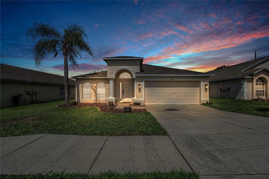 Welcome to your dream home in the picturesque town of Zephyrhills! This charming four-bedroom, two-bathroom home boasts modern amenities and a prime location for your comfort and convenience. Step inside to discover a spacious interior boasting vaulted ceilings, creating an airy and inviting atmosphere. The open floor plan seamlessly connects the living, dining, and kitchen areas, perfect for entertaining guests or relaxing with loved ones. The split floorplan layout ensures privacy and tranquility, with the primary bedroom tucked away for maximum relaxation. Here, you'll find a generous walk-in closet and a private ensuite bathroom featuring a dual sink vanity, soaking tub, and glass-enclosed shower. Cooking enthusiasts will delight in the gourmet kitchen, complete with sleek stainless-steel appliances, a convenient pantry, and a breakfast bar for casual dining. Enjoy your morning coffee in the cozy breakfast nook, or savor meals al fresco on the back patio accessed through sliding glass doors. Speaking of outdoor living, the spacious backyard provides ample space to unleash your creativity, whether it's setting up a grill for weekend barbecues or simply basking in the Florida sunshine. Recent upgrades include a 2025 roof, 2023 A/C air ducts replaced offering both energy efficiency and peace of mind for years to come. Backyard fence 2022, Ceiling fans 2022, New kitchen appliances 2023 and exterior paint 2026. Located just minutes away from shopping centers and a variety of restaurants, you'll never run out of options for dining and entertainment. Plus, easy access to the nearby 301 ensures convenient travel to wherever your adventures may take you. Don't miss out on the opportunity to make this beautiful Zephyrhills retreat your own – schedule a showing today and start living the Florida lifestyle you've always dreamed of!