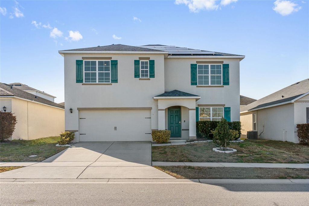 Photo of 305 Meadowbrook Boulevard, Winter Haven, FL 33881 (MLS # O6381073)