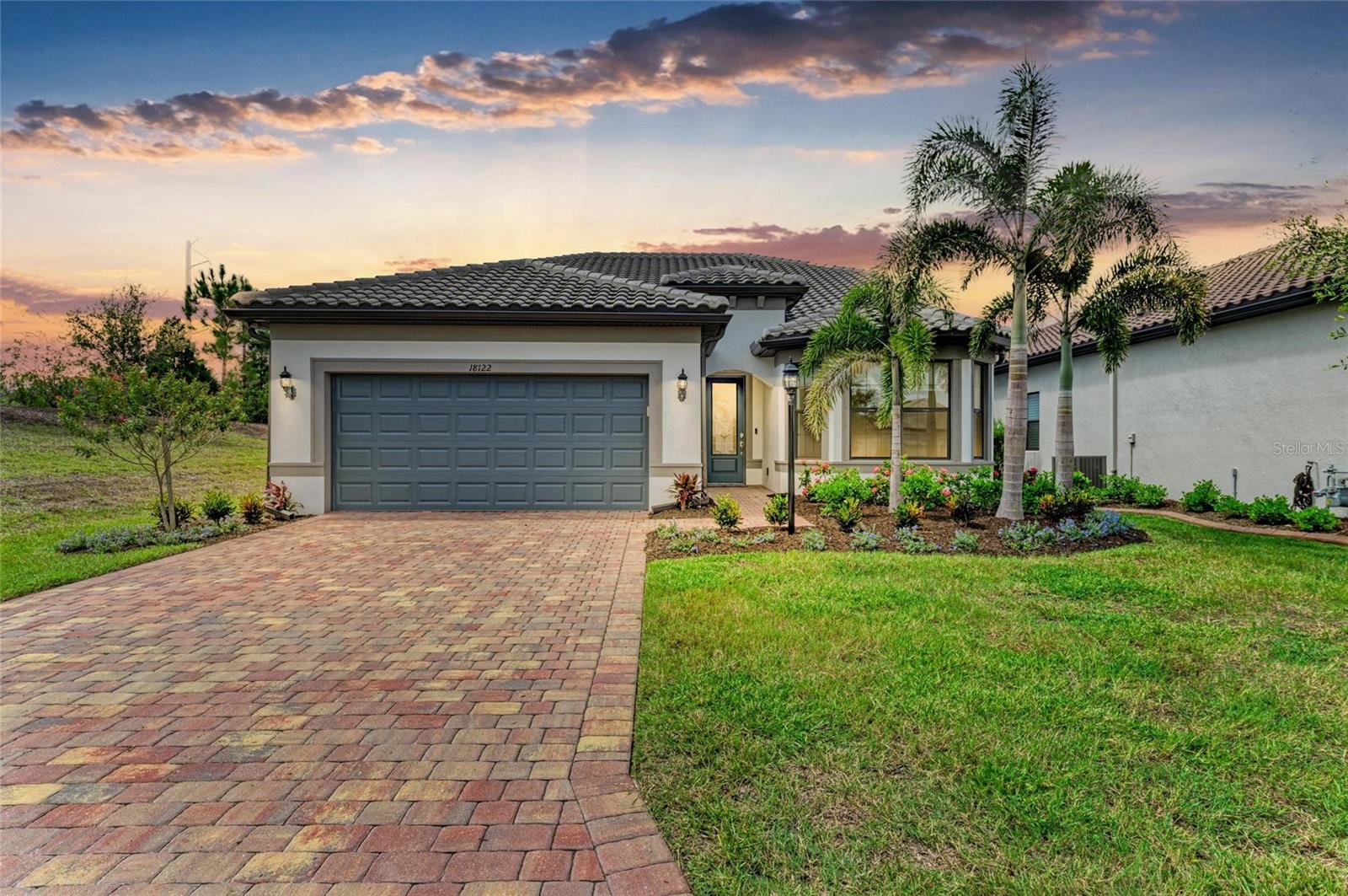 This stunning Mystique Grand model in the sought-after 55+ community of Del Webb Lakewood Ranch offers the perfect combination of style, space, and functionality. Featuring 3 bedrooms, 3 full bathrooms, OFFICE/DEN, SPACIOUS LOFT and 2,917 sq ft of beautifully appointed living space, this home is designed for both everyday comfort and elegant entertaining. Step outside to your private backyard retreat and enjoy the SALTWATER POOL with fountains, EXTENDED COVERED lanai, and tranquil POND VIEW surrounded by a parklike conservation setting. The lanai is ready for a custom summer kitchen with gas, electric, and plumbing hookups. VIRTUALLY WALK THROUGH this home by viewing the LINK to the Matterport 3D tour. Inside, the open-concept floor plan flows seamlessly into the heart of the home—your DESIGNER KITCHEN, complete with premium KitchenAid stainless steel appliances, a JennAir counter-depth French door refrigerator, natural gas 5-burner cooktop, double convection wall ovens, quartz countertops, brass hardware, pendant lighting, and custom walk-in pantry. The oversized island and cozy dining nook is a perfect space for gatherings, while the adjacent great room—with pocket sliders and built-in Sonos sound system—extends the living space outdoors. The PRIMARY suite is on the main level and features tray ceilings, a luxurious en-suite bathroom with dual vanities, frameless glass shower, private water closet, and a large custom walk-in closet with built-ins. The second bedroom and full bath are situated at the front of the home, along with a versatile office/den featuring elegant French doors, tray ceilings and recessed lighting—perfect for a home office, gym, or additional guest space. Upstairs, the expansive loft offers a comfortable second living area, new carpet installed in 2025, a third bedroom with walk-in closet, full bathroom, and abundant storage—perfect for hosting guests or an IN-LAW or GUEST SUITE. The TANDEM 3-car garage includes an epoxy-coated floor, EV outlet, a 4-FOOT EXTENSION, and pull-down attic access for extra overhead storage.
Discover the Florida lifestyle you've been dreaming of in this exceptional home located in award-winning Lakewood Ranch—the #1 multigenerational master-planned community in the country. Just minutes from world-class shopping, dining, top-rated beaches, and top-tier medical facilities, this location offers the ultimate in convenience and quality of life. But it’s not just about where you live—it’s how you live. Whether you're meeting friends for happy hour with live music at the Lake House Restaurant, joining a fitness class, diving into one of the resort-style pools, or playing a round of pickleball or tennis, there's always something exciting to do. With a full-time lifestyle director and a wide variety of social clubs and activities, staying active, connected, and entertained comes effortlessly. Don’t miss your chance to preview this beautiful home and experience the vibrant community lifestyle for yourself schedule your visit today!
