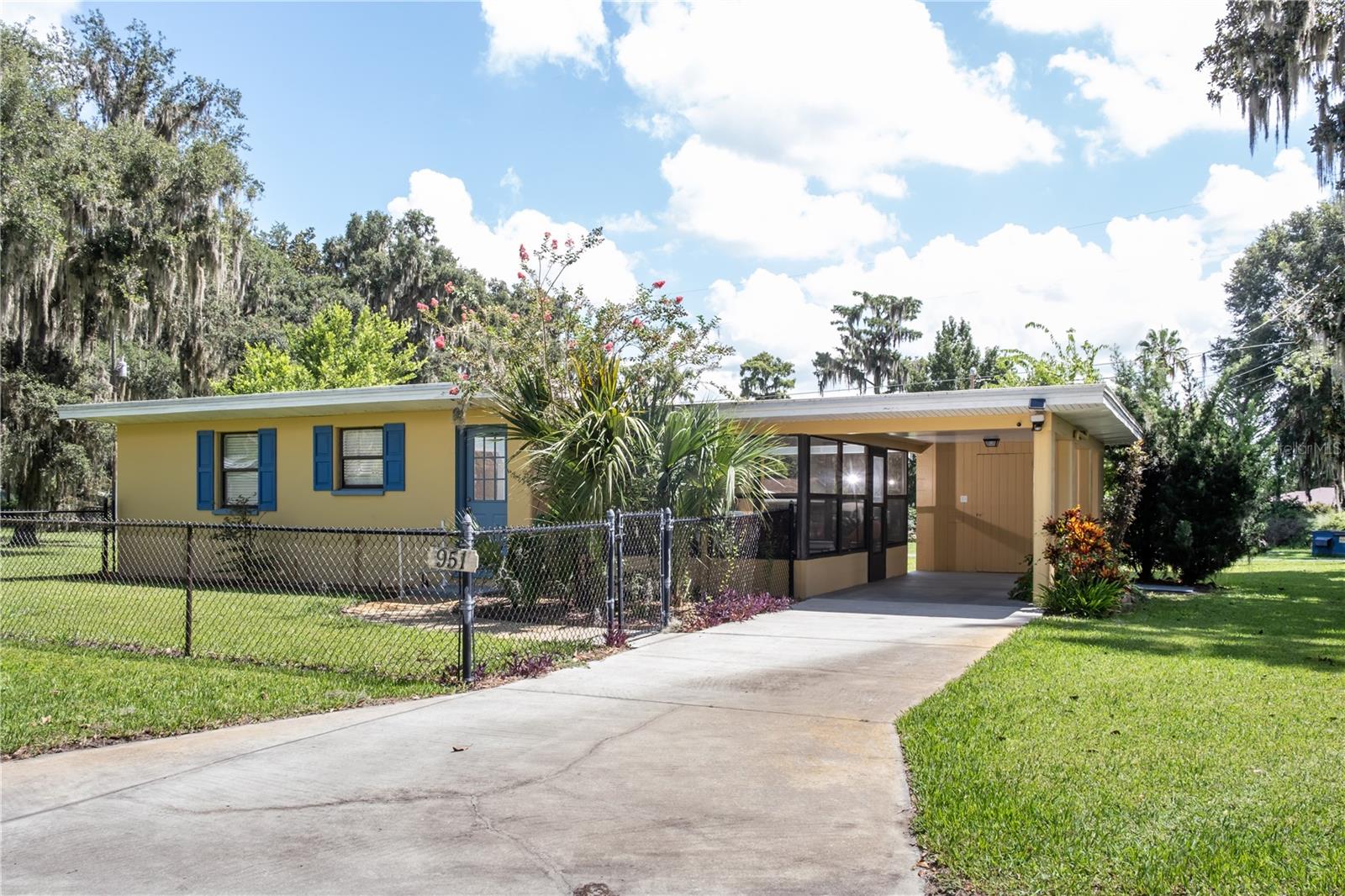 Welcome to this adorable 2-bedroom, 1-bath gem in the sought-after Tracy’s Point community. This charming home features a spacious Florida room, RV hook-up, and sits on a rare 3-lot assemblage, offering plenty of space for your boat, golf cart, and all your toys. Enjoy the perks of deeded boat launch access to the pristine waters of Lake Panasoffkee—a spring-fed lake renowned for top-notch fishing including largemouth bass, bluegill, speckled perch, and more.
Recent upgrades include new kitchen cabinets, countertops, flooring, fresh paint, and a split system in the living/kitchen area for year-round comfort. A sprinkler system with a well adds convenience to the beautifully maintained yard. Kitchen appliances, washer/dryer, and all furniture are included at no additional charge, making this home truly move-in ready.
Take peaceful walks under the tree-shaded streets, soak in lake views, and enjoy the quiet of rural living—all while being just minutes from I-75 and within easy reach of Inverness, The Villages, Ocala, Orlando, and Tampa. With an A+ rated elementary school nearby and amazing local restaurants, this is Florida living at its best. Don’t miss this rare opportunity—schedule your showing today!