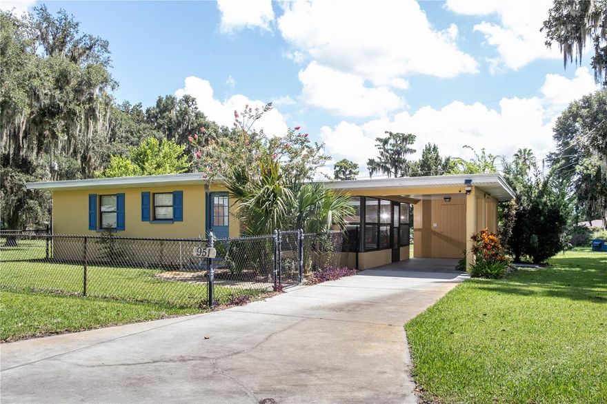 Welcome to this adorable 2-bedroom, 1-bath gem in the sought-after Tracy’s Point community. This charming home features a spacious Florida room, RV hook-up, and sits on a rare 3-lot assemblage, offering plenty of space for your boat, golf cart, and all your toys. Enjoy the perks of deeded boat launch access to the pristine waters of Lake Panasoffkee—a spring-fed lake renowned for top-notch fishing including largemouth bass, bluegill, speckled perch, and more.

Seller provides flexibility and is willing to convey the property with any combination of 1, 2, or all 3 lots. Perfect for buyers who want options. Reach out for pricing options and lot configurations.

Recent upgrades include new kitchen cabinets, countertops, flooring, fresh paint, and a split system in the living/kitchen area for year-round comfort. A sprinkler system with a well adds convenience to the beautifully maintained yard. Kitchen appliances, washer/dryer, and all furniture are included at no additional charge, making this home truly move-in ready.

Take peaceful walks under the tree-shaded streets, soak in lake views, and enjoy the quiet of rural living—all while being just minutes from I-75 and within easy reach of Inverness, The Villages, Ocala, Orlando, and Tampa. With an A+ rated elementary school nearby and amazing local restaurants, this is Florida living at its best. Don’t miss this rare opportunity—schedule your showing today!