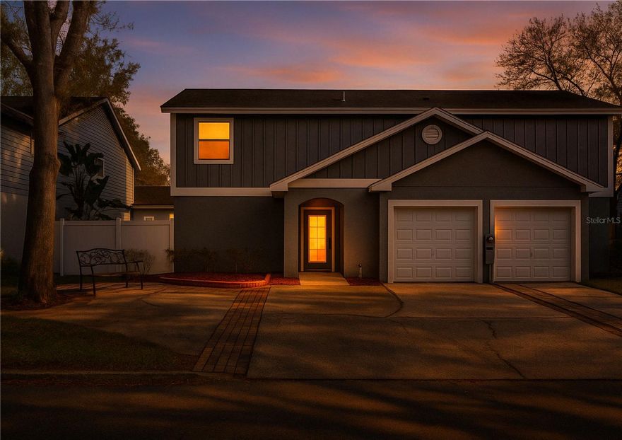 One or more photo(s) has been virtually staged. Back on Market with $10,000 Price Improvement!!   Buyer got "cold feet" before inspections were even done. Brand new plumbing just installed !!    Welcome to this beautifully renovated 2-bedroom, 2.5-bathroom townhome offering just shy of 1,400 square feet of thoughtfully designed living space in the heart of Northdale, just north of Carrollwood. Pride of ownership shines throughout, featuring a mix of laminate and tile flooring—no carpet anywhere—plus high-end finishes like stand-up showers in both bathrooms, a skylight in the primary bath, custom closet buildouts, and stylish updates from top to bottom.  

Enjoy added touches like recessed lighting, upgraded fixtures, a custom electric fireplace, and a built-in storage closet under the stairs. The kitchen boasts sleek granite countertops, adding a refined touch to the heart of the home.

Downstairs flows seamlessly into a fully screened-in lanai—perfect for relaxing or entertaining—which leads to a brick-paved backyard with low-maintenance turf. Out front, enjoy west-facing sunset views from your landscaped entryway, now enhanced with a cement walkway. The converted garage serves as a dedicated laundry area and bonus storage space, and the extended driveway fits up to four vehicles—rare for a townhome!

This home's location is as unique as it is convenient. Nestled among a mix of custom homes and larger estates, the area offers a semi-rural feel rarely found this close to the city—mature trees, room to breathe, and a refreshing departure from cookie-cutter communities.

Located in a top-rated school district—Steinbrenner High, Hill Middle, and Northwest Elementary—you’ll also enjoy a community pool, clubhouse, playground, and direct access to tranquil Le Clare Lake, featuring a dock, kayak storage, boat ramp, picnic shelter, BBQ grill, and open green space.

With a low quarterly HOA and easy access to the Veterans Expressway, Dale Mabry Hwy, Publix, St. Joseph’s Hospital, Sam’s Club, and Citrus Park Mall, this turnkey townhome is the perfect blend of comfort, charm, and location. Whether you're a first-time buyer or looking to downsize—this home is a standout opportunity.