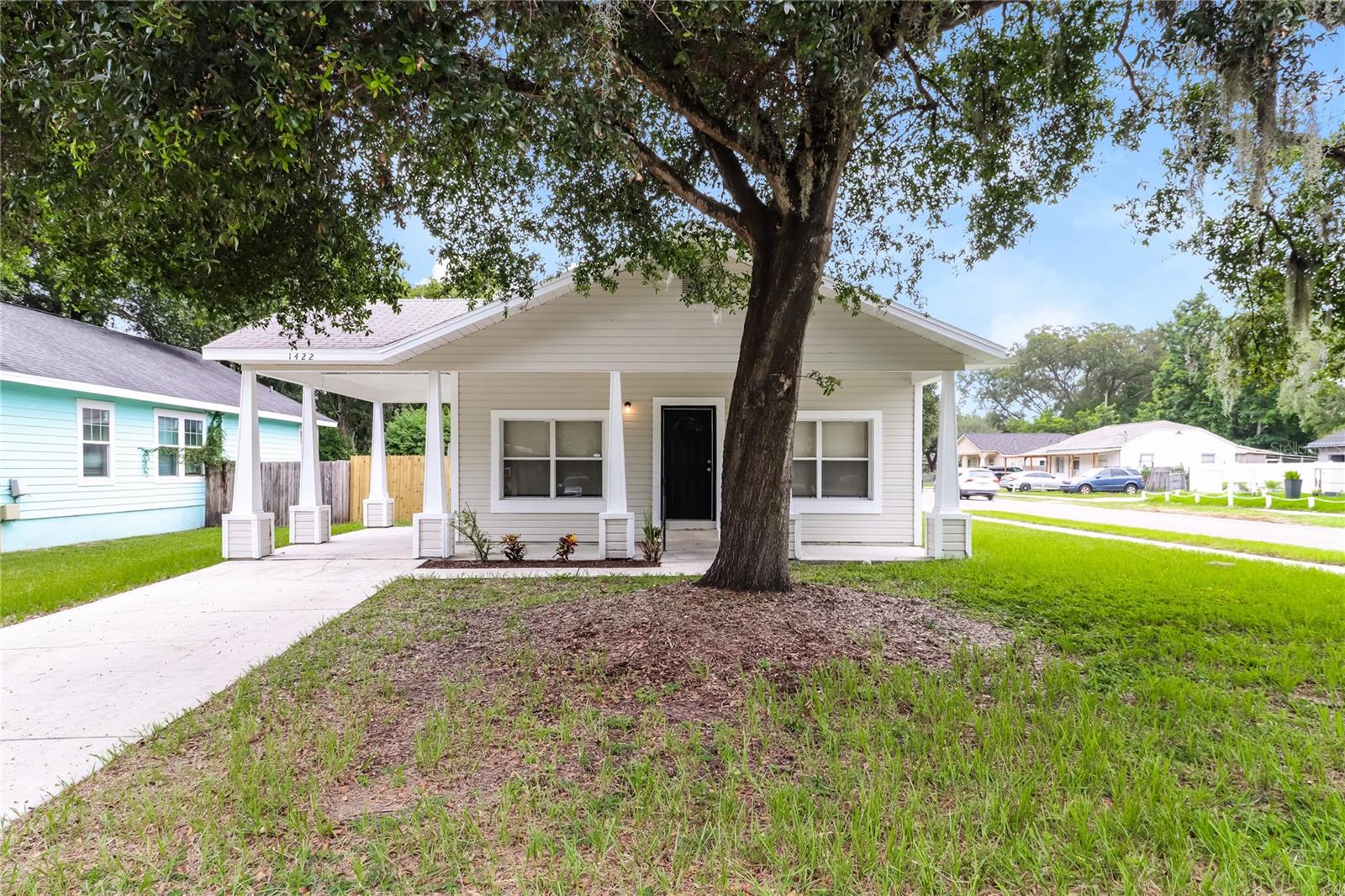 Come check out this beautiful 3 bedroom, 2 bathroom home in desirable Southeast Seminole Heights!! Though built in 07', this home exudes the classic details and charm of the area. Complete with freshly painted exterior & interior, step inside to tall ceilings adorned with crown molding and tons of natural light. Enjoy the split floorplan providing privacy to the master suite complete with en suite bathroom boasting large walk-in shower and refinished countertops. Brand new LVP flooring in bedrooms and new ceiling fans in multiple rooms! Access the rear porch and large fenced-in backyard with brand new privacy fencing through the french doors off the kitchen or master bedroom! New water heater! Convenient to wonderful local food destinations, breweries, grocery stores, interstates, and more...all while being just a short drive away to just about everything in Tampa!
