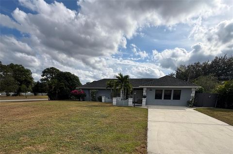 Photo of 706 E 4th Street, Lehigh Acres, FL 33936 (MLS # TB8455120)