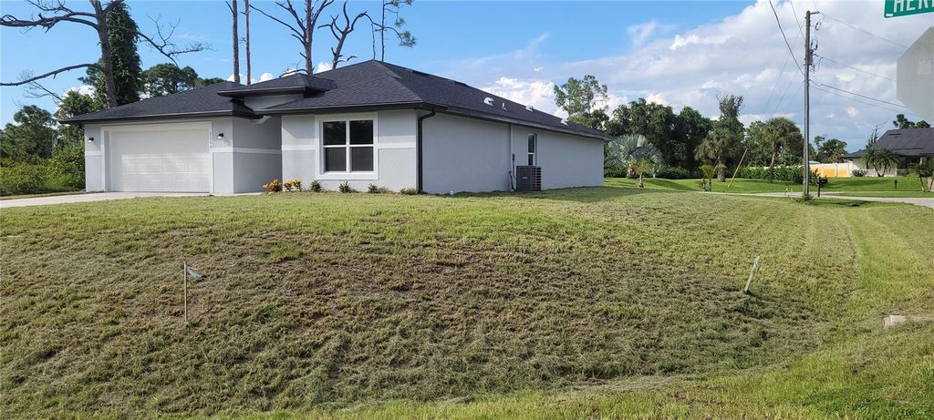 Photo of 1166 Heritage Avenue, North Port, FL 34288 (MLS # A4665379)