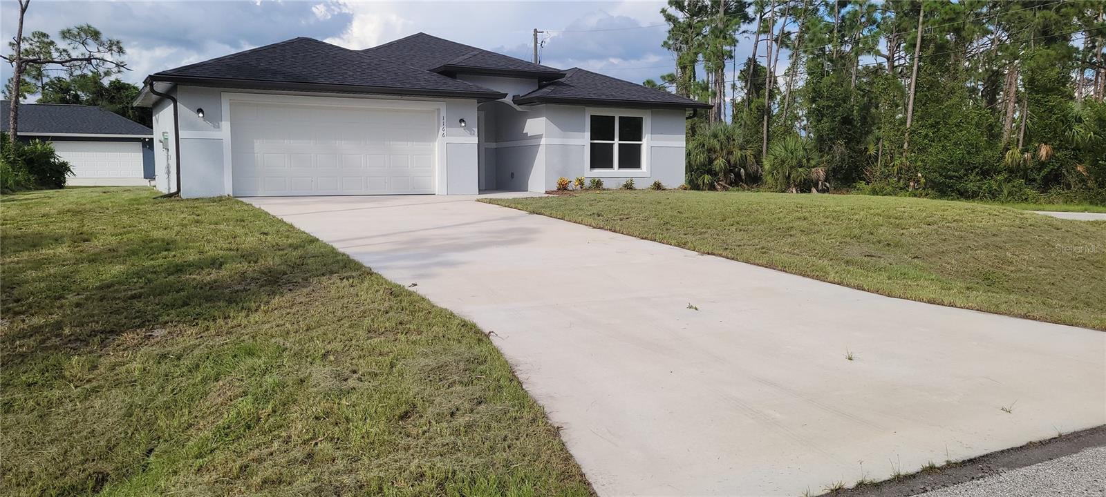 Available immediately for annual rent in North Port, this brand-new home built in 2025 has never been lived in. It features 4BR 2BA, and nearly 1,800 square feet of living space. The open-concept design includes a spacious kitchen with a large island, perfect for entertaining. Situated on a 11,000-square-foot lot, the property offers ample outdoor space while being conveniently located near I-75, schools, shopping, and dining. Whether you're a growing family or looking for a fresh start in Florida’s fastest-growing city, this home checks all the boxes. Additional features include a laundry closet and a two-car attached garage.
