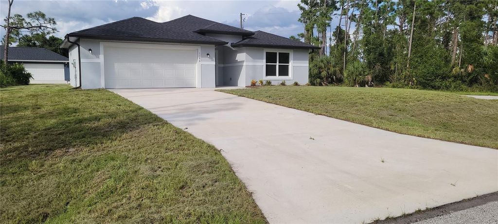 Photo of 1166 Heritage Avenue, North Port, FL 34288 (MLS # A4665379)