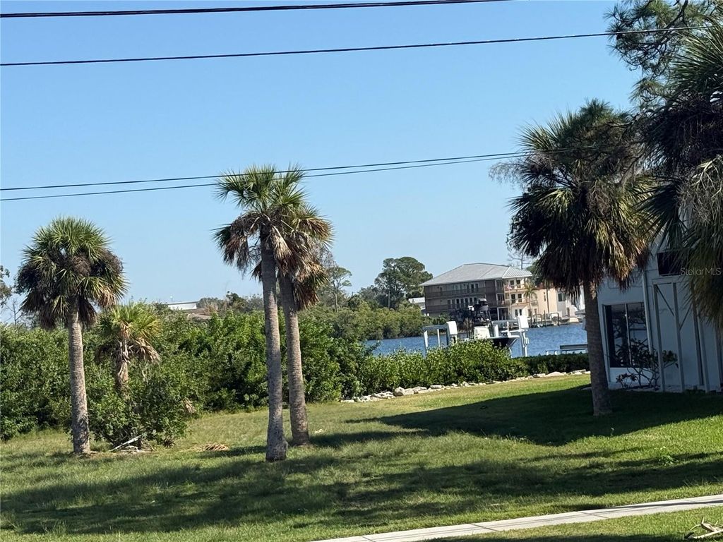 Photo of 653 Bayshore Drive, Tarpon Springs, FL 34689 (MLS # TB8450233)
