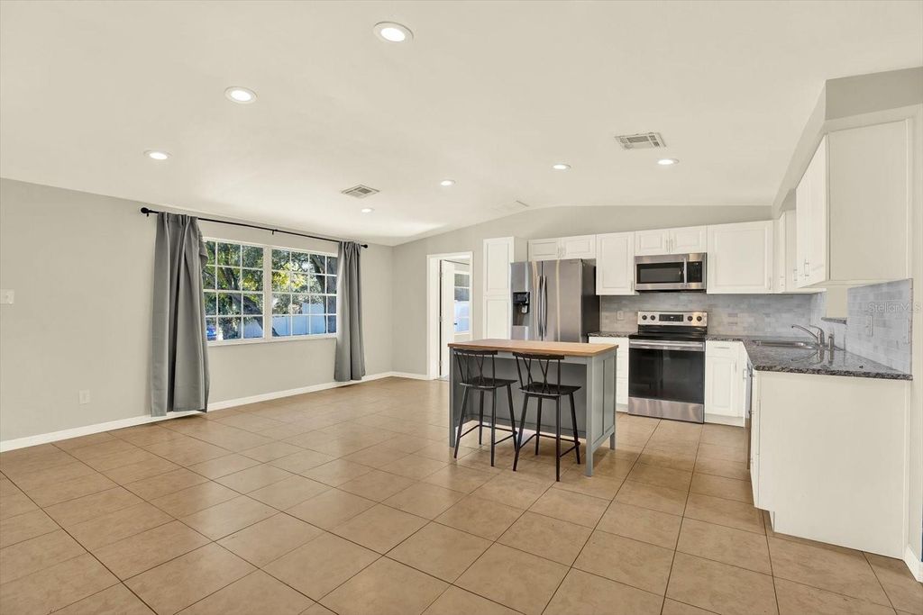 Photo of 11404 N 52nd Street, Tampa, FL 33617 (MLS # TB8469709)