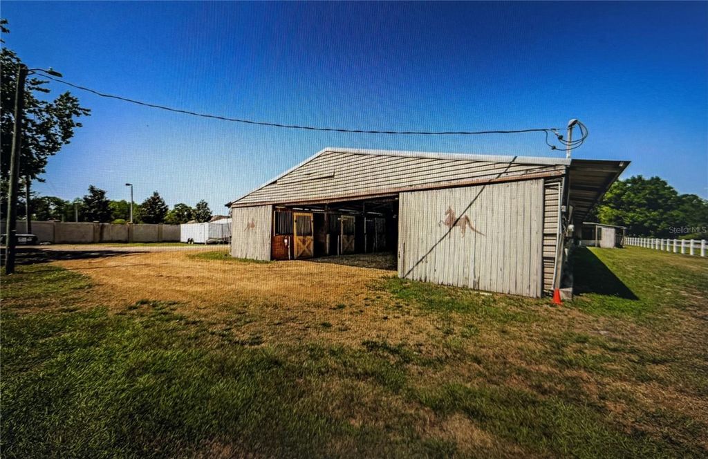 Photo of 10502 Henderson Road, Tampa, FL 33625 (MLS # TB8392922)