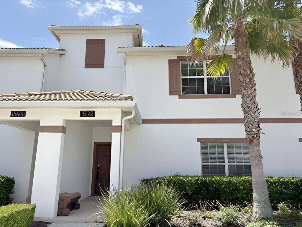 Photo of 1592 Moon Valley Drive, Davenport, FL 33896 (MLS # P4939476)