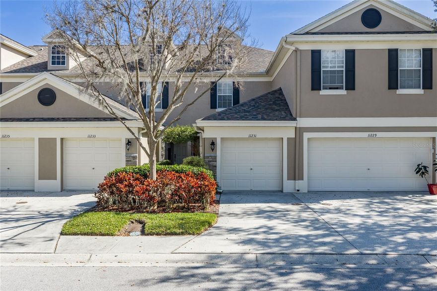 This impeccably maintained townhome shows true pride of ownership. Enjoy maintenance-free living in this 2-bedroom, 2.5-bath home located in the highly desirable WESTCHASE/Citrus Park area. The eat-in kitchen features all egg shell appliance package. Relax in the spacious primary suite, complete with a walk-in closet, en suite bath, and beautiful tree-lined views. The tiled, screened-in porch offers added privacy and a perfect spot to unwind with beautiful garden views. Additional upgrades include recessed lighting and built-in Bluetooth speakers. This community offers a sparkling pool and low HOA fees of just $276 monthly. Conveniently located near top-rated restaurants, shopping, and the airport.