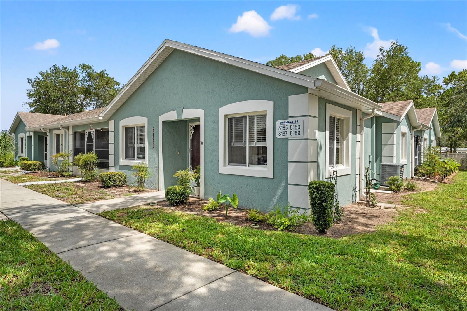 Welcome to 8189 Sturbridge Court in beautiful Weeki Wachee, Florida! Just a hop, skip, and a jump from the crystal-clear, spring-fed Weeki Wachee River—perfect for kayaking, paddle boarding, or simply soaking in the natural beauty. This bright and airy corner unit condo is nestled in a peaceful community with a country feel, yet just north of Cortez Blvd where shopping, dining, entertainment, and medical centers are all close by. And best of all - it's not located in a flood zone! Inside, you’ll find 2 spacious bedrooms and 2 full bathrooms. The primary suite offers a walk-in closet, ensuite bath with step-in shower, and sliding doors leading to the enclosed lanai/Florida room—a lovely spot to start or end your day. The second bedroom also features a spacious walk-in closet and is flexible for guests, kids, a home office, or creative space. The second bath includes a tub/shower combo.Recent updates include a freshly painted interior and beautiful luxury vinyl plank flooring in the living room, hallway, and both bathrooms—giving the home a clean, modern feel. Enjoy maintenance-free living with the condo association handling exterior maintenance including the roof, painting, trimming, and mowing. The monthly HOA fee includes Cable TV, Internet, trash pickup, and access to community amenities. Residents have full access to Pickett’s Park, featuring a sparkling swimming pool, spa, fitness center, clubhouse, and outdoor grilling area—a perfect place to relax, stay active, and enjoy the Florida lifestyle. Whether you're looking for a year-round residence or a seasonal retreat, 8189 Sturbridge Court offers comfort, convenience, and charm in one beautiful package!