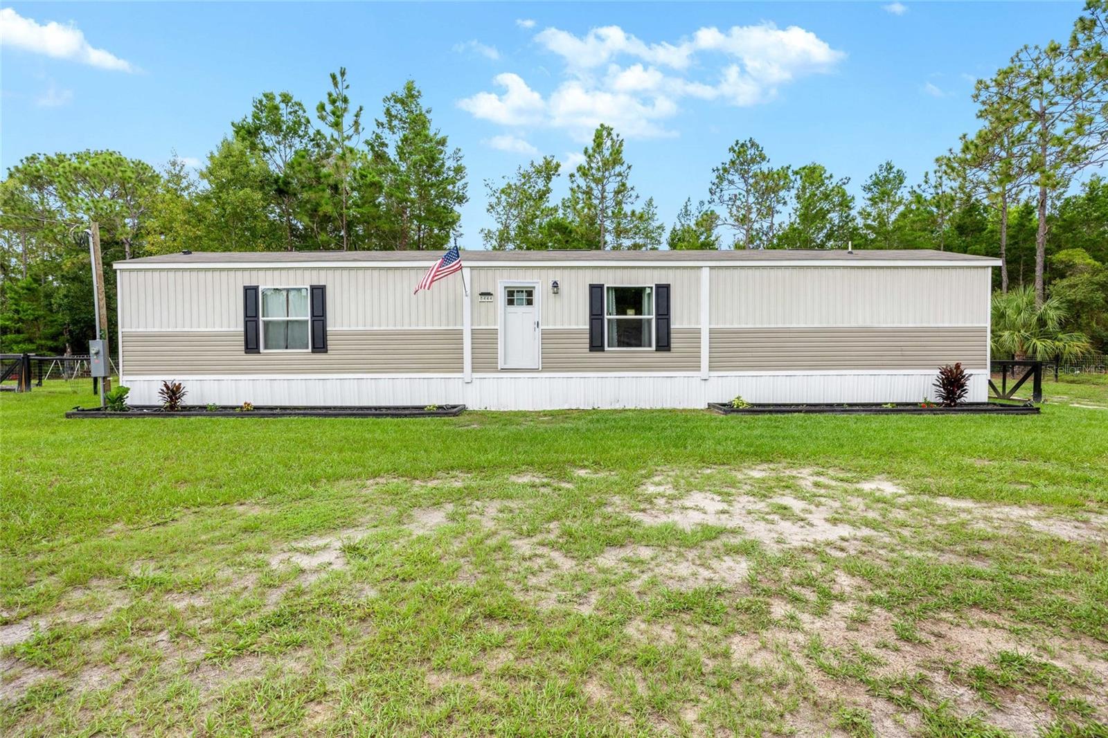 Welcome to your peaceful retreat in Crystal River! Situated on 1.03 acres of open space, this charming 2-bedroom, 2-bath manufactured home offers comfort, functionality, and privacy. Step inside to an inviting open floor plan filled with natural light, perfect for everyday living and entertaining. The kitchen features ample cabinetry, modern finishes, and flows seamlessly into the living dining area. A bonus room offers flexible use as extra storage, a pantry, or a small office. The water filtration system ensures fresh, clean water throughout the home. Both bedrooms are generously sized, with the primary suite offering its own private bath complete with his and hers sinks. Enjoy the outdoors with plenty of space for gardening, recreation, or simply soaking in the tranquil surroundings. A storage shed in the backyard—left by the sellers—practical for tools and equipment. Located just a short drive from shopping, dining, and the natural beauty of Crystal River, this home combines rural serenity with modern convenience. Don’t miss your chance to own this slice of Florida living—schedule your showing today!