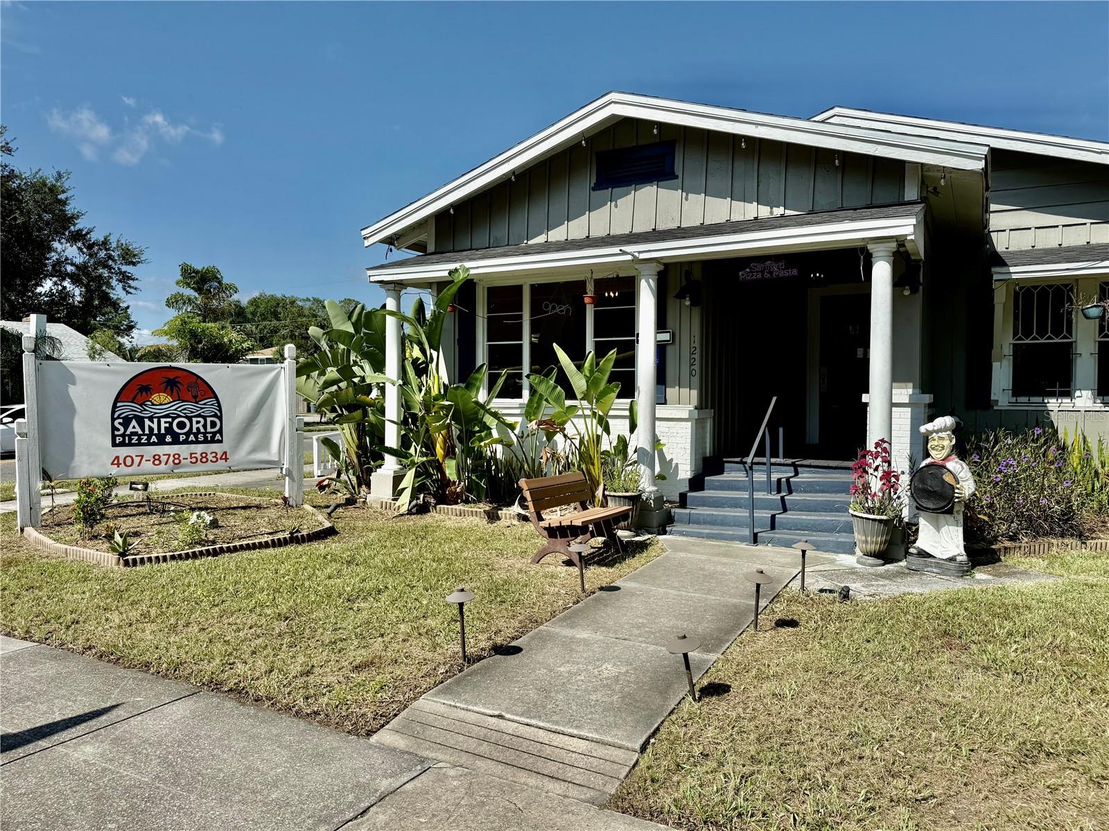 This rare commercial restaurant lease opportunity is located in Downtown Sanford, just outside the historic district and within the Sanford Golf Cart Zone. It's an ideal space for a full-service restaurant, catering business, and/or event venue. The property is available TURNKEY, which includes all equipment, prep tables, small wares, a security camera system, and all tables and chairs, at an additional rate. Please inquire for more information on the turnkey option. The space features a massive kitchen at approximately 1,080 sq. ft., a 1,000 sq. ft. dining room with seating for 80 inside and 60 outside, and a 200 sq. ft. dry storage area. Parking lot is included. Key features of the property include a new walk-in cooler and freezer, an 8.5 ft. hood system, a 3-compartment sink with a dishwasher hookup, a private office, a newer roof, and central heat and air. This opportunity won't last long, so inquire today for your private showing.