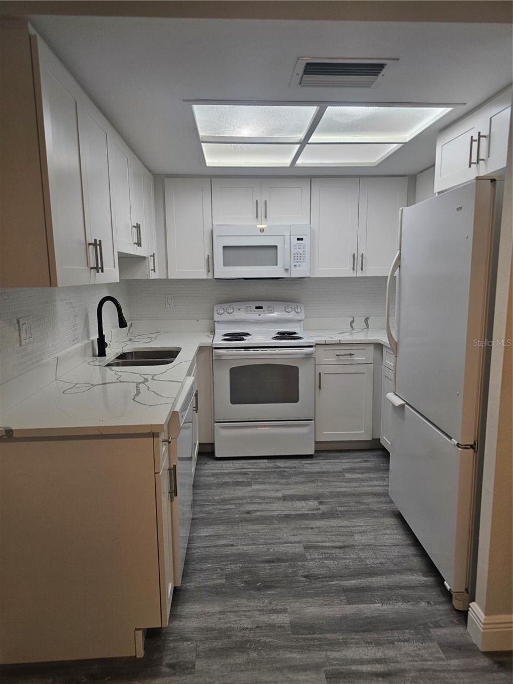 Photo of 1107 Queen Anne Drive #C, Palm Harbor, FL 34684 (MLS # TB8460870)