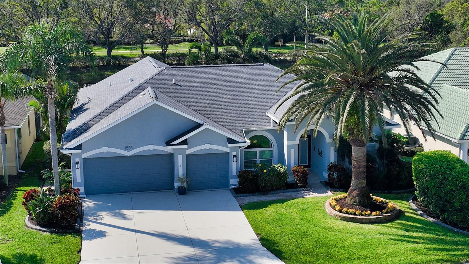 HUGE PRICE ADJUSTMENT!! Outstanding custom built York model 4BR/3BA with 3 car garage ranch style pool home in very desirable centrally located Palmer Ranch in Stonebridge. Lovely setting with beautiful, mature landscaping with automatic re-cycled water system, includes 2,376 square feet of living area that opens to large screened lanai with solar heated pool and southwest exposure of gorgeous sunsets and scenic lake views. This beautiful home has been re-modeled with plantation shutters throughout, hardwood flooring in the foyer and dining room and beautiful light shade of 20 x 12 tile in the kitchen and bathrooms. The home features front double glass doors that have built-in blinds, vaulted ceiling in great room with sliders going out to lanai and pool area and All New Impact Windows and Doors installed in 2016. New Roof – 2018. New HVAC – 2019 and New Hot Water Heater installed in 2017. The exterior of the home was professionally painted in 2022. Culligan Man water filtration system. Pool bath features a beautiful shower with glass door that has built-in blinds going out to lanai. Laundry room has built-in custom cabinetry, home has in-wall pest control system, lots of storage throughout including wood working benches and pull-down attic space above the 3 car garage. Front yard has spectacular palm tree in front yard. House has been professionally re-piped. Stonebridge is a quiet wonderful community with sidewalks, street lights and large community pool and low HOA fees. Excellent schools. Close to bus stop, 18 mile Legacy walking/bike trail, COSTCO and state-of-the-art Core SRQ gym and lots of restaurants and shopping. Just minutes to Siesta Key beach voted #1 beach in the country! Agents Please read the realtors remarks for important information concerning offers.
