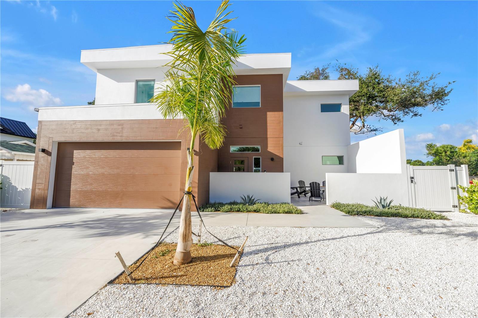 Make yourself at home in this stunning brand-new getaway, where everyday living feels like a vacation. With over 3,600 square feet of beautifully designed space, this home offers all the room you need to relax, work, entertain, and truly settle into the Sarasota lifestyle. Step through the charming courtyard entrance and into bright, open living areas filled with natural light and tall ceilings, to find a comfortable layout and tasteful details that create a space that is as welcoming as it is impressive. The kitchen will quickly become your favorite spot, with high-end appliances, custom cabinets, a walk-in pantry, and a large quartz island that is perfect for casual meals or conversation while cooking. Life here flows easily from indoors to out, with multi-panel sliding glass doors that open to your own private fenced backyard retreat, featuring a relaxing spa and sparkling saltwater pool that surrounds a cozy recessed fire lounge, creating a distinctive and luxurious ambiance. The outdoor kitchen, complete with grill, sink, refrigerator, and bar seating, makes hosting friends a breeze, while the air-conditioned pool house, with a half bath and an outdoor shower, adds even more convenience. Each of the six bedrooms has its own en suite bath and walk-in closet, giving you and your guests privacy and comfort. There is also a second-floor balcony for morning coffee, a full laundry room with a utility sink, and a spacious two-car garage. Located in a highly desirable Sarasota neighborhood, this home is available for weekly stays but is especially ideal for longer rentals. You will be just minutes from world-class beaches of Siesta Key, lively downtown Sarasota, and some of the area’s best dining and shopping. Whether you are here for a season or a year, this home offers the perfect balance of relaxation and convenience. **SEASONAL / MONTHLY / WEEKLY RENTAL AVAILABLE. PLEASE INQUIRE W/ LISTING AGENT**