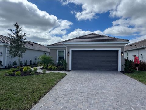 Photo of 29464 Velletri Lane, Wesley Chapel, FL 33543 (MLS # J993840)
