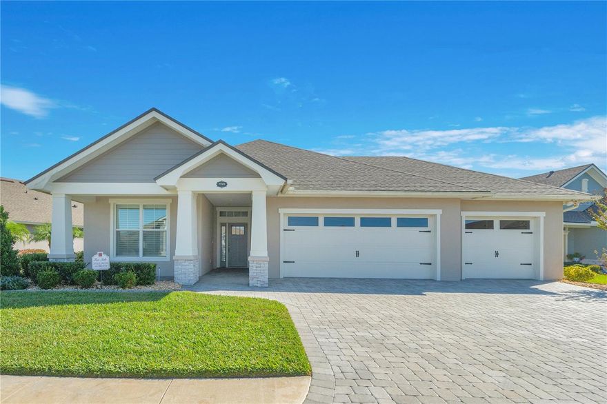 Welcome to this beautifully upgraded 3-bedroom, 2-bath home located in the highly desired Lake James community of Lakeland. With no rear neighbors, elegant finishes, and a thoughtfully designed layout, this home offers the perfect blend of comfort, style, and privacy.

Step into the heart of the home—an impressive kitchen featuring a massive center island with seating, stone countertops, dark cabinetry with crown molding, tile backsplash, and matching stainless steel appliances. This open, inviting space flows seamlessly into the living and dining areas, making it ideal for both entertaining and everyday living.

The primary suite is a true retreat, complete with a luxurious ensuite bathroom featuring a massive walk-in shower with a built-in seat and convenience railing, dual sinks, and generous storage. The additional bedrooms offer comfort and flexibility for guests, hobbies, or a home office.

A well-appointed laundry room adds function and efficiency with built-in cabinetry and a utility sink, keeping everything organized and accessible.

Step outside to a peaceful covered patio where you can relax with tranquil views and no neighbors behind you. An oversized 3-car garage provides ample space for vehicles, tools, and storage.

Conveniently located near entertainment, restaurants, major roadways, and more, this Lake James home delivers comfort, style, and an unbeatable location.