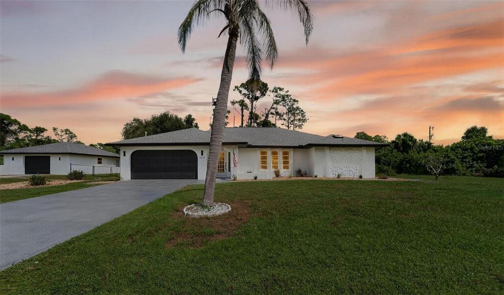 Photo of 1112 Cornelius Boulevard, Port Charlotte, FL 33953 (MLS # O6347628)