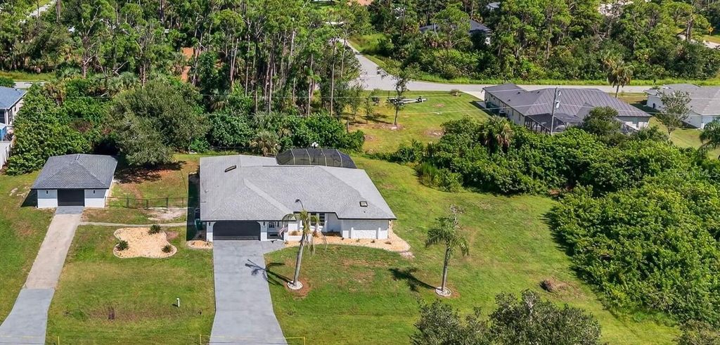 Photo of 1112 Cornelius Boulevard, Port Charlotte, FL 33953 (MLS # O6347628)
