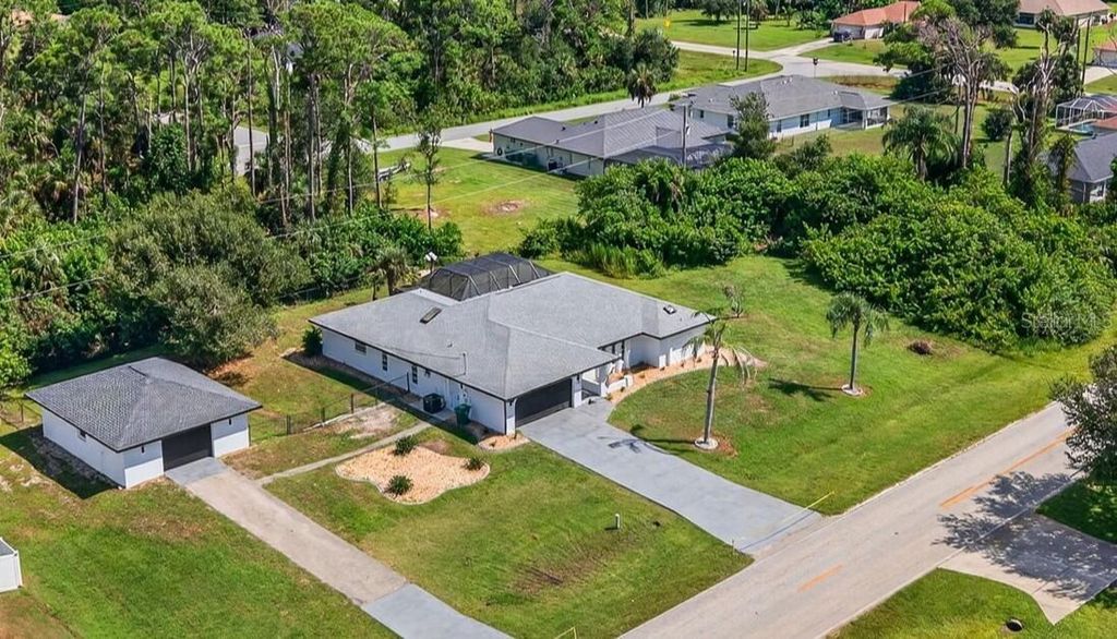 Photo of 1112 Cornelius Boulevard, Port Charlotte, FL 33953 (MLS # O6347628)