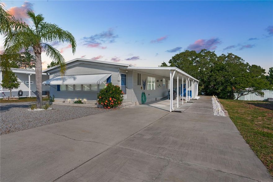 A pristine, move-in ready home in a gated 55+ community with tons of amenities? No, you're not dreaming, it's your dream home come to life! This Palm Harbor-built mobile home in highly desirable Brookridge is beautiful inside and out, starting with the low-maintenance xeriscaped lawn. Inside, the split-bedroom floor plan comes furnished and is fully turnkey! It's both expansive and functional, with vaulted ceilings adding volume to the space. A wood-burning fireplace flanked by two cushioned window seats creates a cozy focal point in the living room. The kitchen is bright and open with lots of cabinet and counter space, a breakfast bar, pantry, and a large eating nook. Skylights gently illuminate the luxury vinyl plank flooring here, which extends into a big family room. It's a great spot where everyone can gather for game or movie night. Retreat to the primary suite after a long day of golfing and socializing at the clubhouse; it's private with a large closet. The ensuite primary bathroom offers dual sink vanities and a walk-in shower. The other two guest bedrooms are also quite sizable; one of them has extensive built-in shelving, expanding your storage capacity. They share a guest bathroom with a tub/shower combo. An indoor utility room provides easy access to the washer and dryer. A newer wooden ramp leads out to the covered carport, where the workshop and storage area await. Here, you'll find a workbench and a roll-up garage door that allows you to effortlessly park your golf cart inside. Brookridge is a premiere 55+ gated community filled to the brim with amenities, including 24/7 security, a golf course, clubhouse, community pool, and a variety of sports courts, like tennis, shuffleboard, and bocce ball. Additionally, there's numerous clubs and activities to join for those who enjoy an active, social lifestyle. It's close to a plethora of shopping and dining options in the nearby plazas, plus medical facilities, parks, and more. Weeki Wachee Springs State Park is only 20 minutes away, where you can paddle the river, meet real mermaids, and enjoy the waterpark in the summer months. The Suncoast Parkway is literally moments away, so Tampa and attractions like Busch Gardens, Raymond James Stadium, and the Hard Rock Casino are only about an hour to the south. And the magic of Orlando's theme parks lies less than 2 hours to the east. Private tours are available! Whether you're seeking a seasonal escape from cooler climes or a full-time fun spot to call home, you shouldn't miss the chance to live the Florida lifestyle you deserve. See this home today!