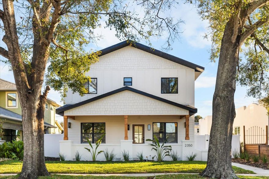 In the beloved St Pete neighborhood of Historic Kenwood, this is custom-reimagined POOL home has been refined with modern luxury and sleek finishes. High and dry non-flood zone, this home checks all the boxes. This home offers 4 bedrooms plus a flex loft space, 4 bathrooms, and over 2600 square feet of beautifully curated living space. Honey toned oak engineered hardwood floors span throughout the home carrying the warmth throughout. The main level features a first-floor bedroom ideal for guests or a home office. The modern kitchen showcases custom cabinetry, tile backsplash, high end appliances and stone countertops. Multiple living spaces downstairs give ample space for hosting. Upstairs, a versatile loft leads to two additional bedrooms and the primary suite. Featuring a walk-in closet, dual vanities and a walk-in tiled shower. An additional two guest bedrooms, two full guest baths, and dedicated laundry room complete the second level. Outdoors, the jewel of this home is the zero scape backyard with in ground pool. A separate two-car garage accessed via the rear alley gives room for kayaks, storage, parking and bikes. Perfectly situated just minutes from Central Avenue, the Warehouse Arts District, Downtown St. Petersburg, and the area’s renowned St. Pete Beach. Schedule your tour today!