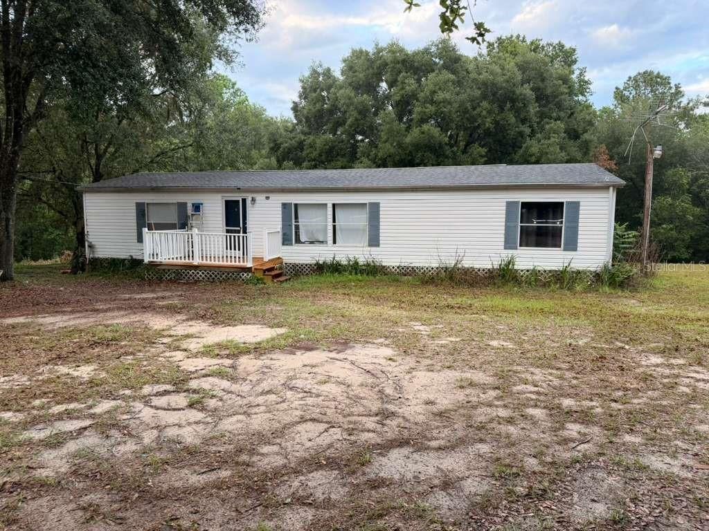 Photo of 24435 Powell Road, Brooksville, FL 34602 (MLS # J1000901)