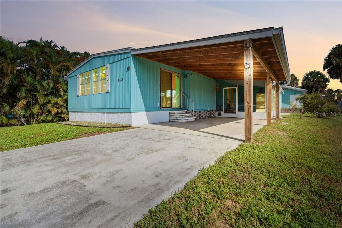 Discover the potential of this 2-bedroom, 2-bathroom home situated in one of Englewood’s most desirable waterfront neighborhoods. Location, Location, Location: Minutes from Englewood’s beautiful beaches, popular dining spots, and grocery stores, this home places you close to everything while maintaining a peaceful coastal feel. Located directly across from a the scenic Lake View canal and boat dock, this property offers the perfect blend of coastal charm and investment appeal—ideal for seasonal rentals, a second home, or your next flip project. Step inside to find a bright and versatile layout featuring a welcoming entryway and a spacious study or den—perfect for a home office or flex space. The open-concept living area flows effortlessly into an eat-in kitchen equipped with an island, stainless steel appliances, and modern finishes. An adjacent eat-in area opens to a sunny dinette, great for casual dining or creating your own coffee nook. Relax in the enclosed, screened-in porch—ideal for entertaining or enjoying peaceful evenings with waterfront breezes. The primary suite includes a walk-in closet and en suite bath with dual sinks. A second bedroom and a stylish guest bath with wainscoting complete the interior. Outside, enjoy a well-sized yard with a storage shed and dedicated workspace—offering extra flexibility for hobbyists, DIY projects, or outdoor storage. Whether you're looking to invest, renovate, or enjoy the Florida lifestyle, this is a property with serious potential. Don’t miss this rare opportunity—schedule your showing today!