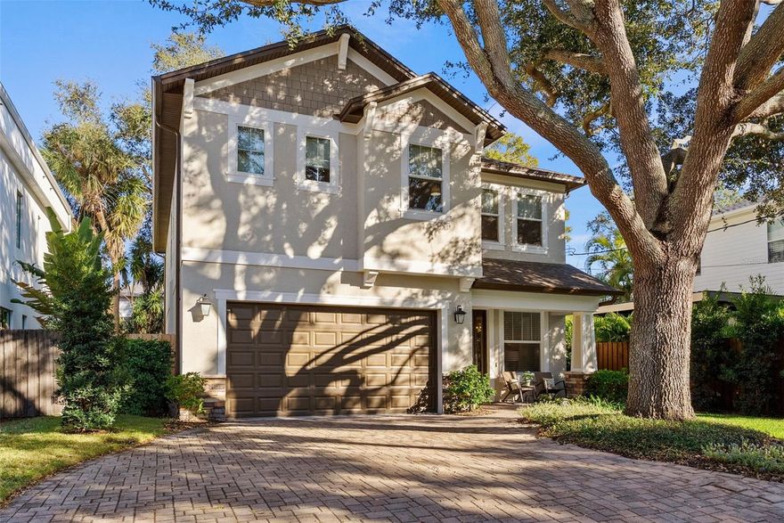 Welcome to this beautifully maintained 4-bedroom, 3.5-bathroom home nestled in the heart of Palma Ceia, tucked away on a serene, tree-lined street. Offering 3,119 square feet of thoughtfully designed living space, this home combines comfort, functionality, and timeless appeal—enhanced by extensive recent upgrades and meticulous care. Upon entry, you’re greeted by a formal living room that also serves perfectly as a home office or bonus space, conveniently located near the powder room for guests. Fresh interior paint gives the home a crisp, updated feel. The home then opens into a seamless layout featuring the family room, dining area, and spacious kitchen—ideal for both everyday living and entertaining. The kitchen has been upgraded with a custom pantry by Top Shelf Closets for optimal organization, along with a GE refrigerator and GE dishwasher (2022), blending functionality with sleek design. Upstairs, all four bedrooms are thoughtfully situated alongside the laundry room for added convenience. The laundry room is equipped with a newer GE washer and dryer (2022), making daily routines effortless. Beautiful new hardwood flooring (2023) elevates the entire second level, creating warmth throughout. The primary suite features a private en-suite bathroom, while a secondary bedroom also enjoys its own en-suite. The remaining two bedrooms are connected by a well-appointed Jack and Jill bathroom, offering both privacy and practicality. New toilets replaced in 2022 add a thoughtful touch of modern comfort. Significant exterior improvements further enhance the home’s appeal. In 2024, the exterior was professionally painted, adding to the home’s curb appeal. In 2025, additional upgrades were completed, including a new fence surrounding the property, all-new irrigation, and enhanced landscaping with added trees, shrubs, and fresh mulch. Step outside to the newly enhanced private backyard, where mature trees and updated landscaping create a peaceful, polished setting ideal for relaxing or entertaining. An oversized two-car garage adds ample storage and everyday convenience. Located in one of South Tampa’s most sought-after neighborhoods, this Palma Ceia home offers the perfect blend of location, space, thoughtful upgrades, and true move-in-ready livability.