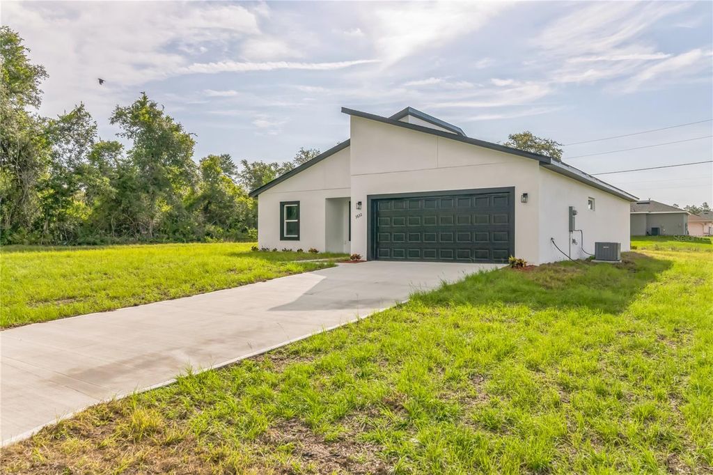 Photo of 8151 SW 135th Loop, Ocala, FL 34473 (MLS # O6345361)