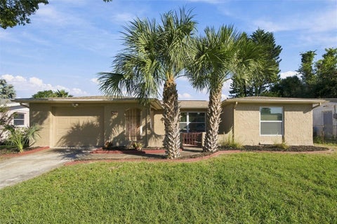 Photo of 7401 Oak Crest Drive, Port Richey, FL 34668 (MLS # TB8561312)