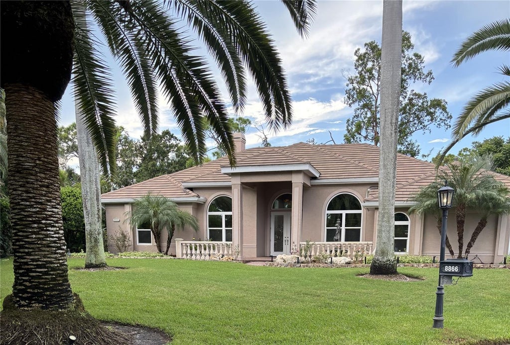 Photo of 8866 Bloomfield Boulevard, Sarasota, FL 34238 (MLS # A4706107)