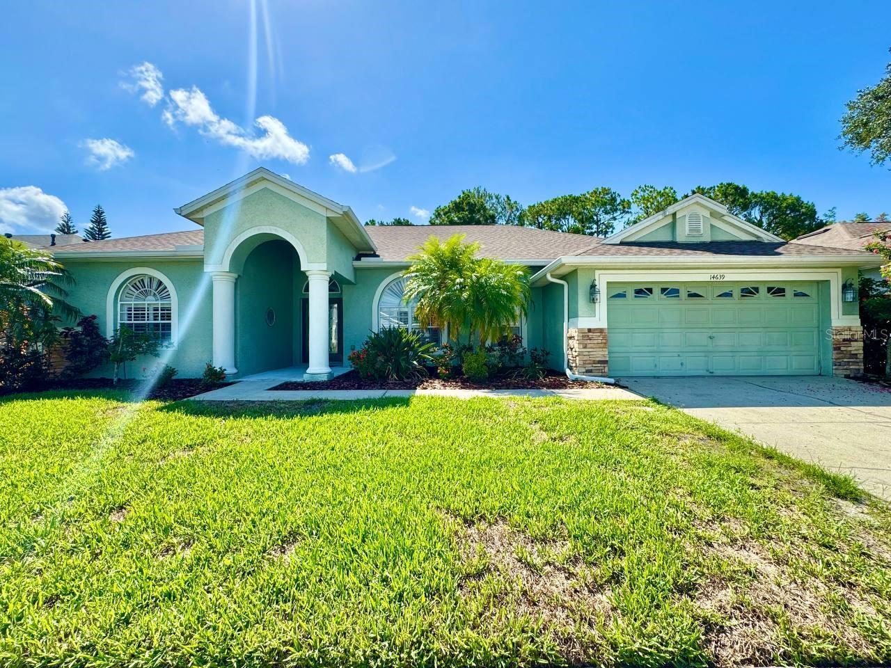 Welcome to your dream home in the highly desirable Westwood Lakes community! This beautifully maintained 4-bedroom, 3-bathroom pool home with a 2-car garage offers the perfect blend of comfort, style, and functionality. Step inside to find gorgeous laminate wood flooring flowing throughout the main living areas, complemented by plush carpeting in the bedrooms. The open floor plan and high ceilings create a bright, airy atmosphere, while ceiling fans throughout add comfort year-round. The kitchen is truly a chef's dream featuring sleek stainless-steel appliances, granite countertops, and an abundance of cabinetry for all your storage needs. Whether you're entertaining or preparing a quiet family dinner, this kitchen is sure to impress. The spacious primary suite is a private retreat, boasting a tray ceiling, a luxurious en-suite bath with dual vanities, a large walk-in shower, a garden soaking tub, and an expansive walk-in closet. Step through the glass sliders to your screened-in lanai complete with a sparkling pool ideal for relaxing or hosting gatherings. Located just minutes from top-rated schools, fantastic restaurants, shopping, and entertainment, this home truly has it all. Don't miss your chance to live in one of Westchase's most sought-after communities schedule your private showing today! In addition to the advertised base rent, all residents are enrolled in the Resident Benefits Package (RBP) for $50.00/month which includes HVAC air filter delivery, credit building to help boost your credit score with timely rent payments, utility concierge service making utility connection a breeze during your move-in, and much more! More details upon application. Pets welcome, max 1 large dog or 2 small dogs. Vacant and Available Now!