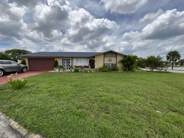 Large 3 bedroom, 3 bath concrete block home with a total of 2,600 sq feet sits on 0.23 of an acres located on a cul-de-sac across the street from a lake. NO Flood, NO HOA, No CDD, LOW taxes!! Enjoy the lake view from many interior rooms or any of the 3 outside patios. A 2 car garage or existing movie theater room awaits your preference. Seller will leave the velvet drapes, carpet, reclining couch, over size bean bag chair, projector and screen. The 2022 HVAC was replaced new and relocated from the attic to an interior storage closet for easy access to service, and added a UV light and Ionizer for germicidal, bacterial, and other contaminants, surge protector, smart Honeywell Wi-Fi thermostat, and cleaned the replaced duct work (approx 2011). The garage door is double insulated hurricane reinforcement. Replaced about 2011. The ROOF is 5 years old dimensional architecture, aesthetic design for appeal, with a long term durability product for wear.
The 3 bathrooms have many upgrades to include heated towel racks, and water conservative toilets, new sinks, faucets, stims, valves and handles. The master bathroom has marble flooring and boasts a lion paw soaking tub with water fall faucet and handheld shower head, TV above towel rack, heated towel rack, portable wash tub for delicate, and elegant entry glass French doors. The sink is a free standing single basin mirror and marble top with water fall and crystal ball handles. The house has several rooms with Demask wallpaper or raised embossed design. A large antique living room wall mirror with beveled edges will remain. The home alarm system is a Simply Safe: doors, windows, motion, glass break sensors. Door entry is a smart lock with touch pad for quick access or departure. Flooring is mainly ceramic tile throughout, with one laminate wood in one bedroom (mother in law). The kitchen bears all 2020 Samsung stainless steel appliances, a wall mount range hood, glass top stove, Boutique ceramic blue glossy glass linear wall backsplash, double farm sink, garbage disposal, dishwasher, and microwave. There is a well sprinkler system with one high volume zone to prevent rust stains on the house and eliminate sprinklers in the common ground areas to help eliminate repairs and falls. The large lot is fenced off in the back for privacy. It has sweet papaya trees and many mature plants, with space on all sides for a garden. The private entry in the 3rd bedroom or (mother in lawsuit) has astro turf, a custom tie Tiki Bar with mini refrigerator, tv mounted to the wall with a removable UV and water protective cover, 1- chaise lounge with 2 Adirondack chairs that face the tiki bar or lake, with sunshade sails to prevent UV rays. Enjoy shopping, restaurants, Gulf of Mexico, Suncoast Parkway, hospitals, new VA Outpatient hospital (opening before the end of the year), forthcoming H. Lee Moffitt Cancer Center and Research Institute (This Institute will have a world-class expansion campus in Pasco County within a few years), beaches, and MORE at your fingertips! Tampa and St Pete Clearwater Airports are minutes away!