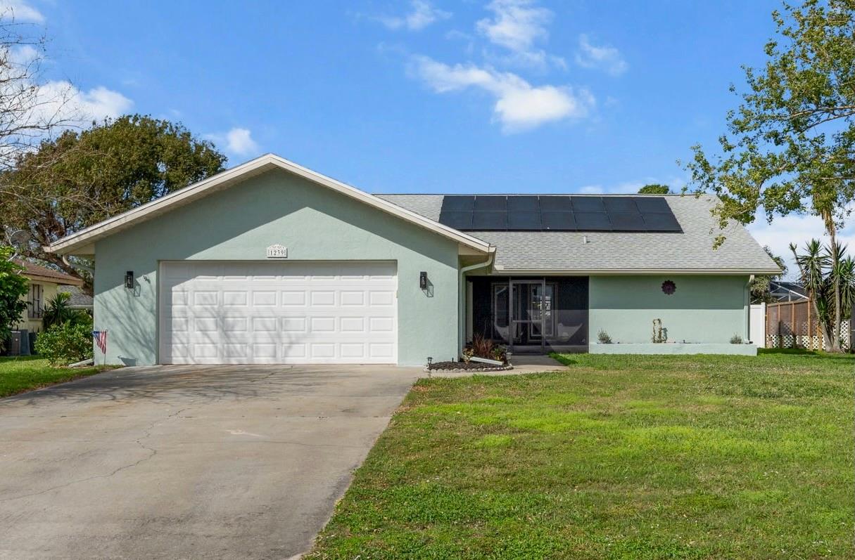 Discover your dream home in the highly sought-after Pinebrook South community, just minutes from Venice and Nokomis beaches, Venice Island, shopping, dining, I-75, and nature preserves. This beautifully updated 2-bedroom, 2-bath home with a bonus room, perfect for a home office or den, offers the ultimate Florida lifestyle! Step inside to an elegant open-concept living space with soaring cathedral ceilings and a wood-burning fireplace in pristine condition. The custom Craftsmaid kitchen is a chef's dream, boasting soft-close cabinetry, pull-out drawer organizers, a spacious island with Quartzite countertops offering additional seating, and all-new appliances. The adjacent walk-in pantry/laundry room features updated tile and a stylish coffee bar, making mornings effortless. Luxury flows throughout with new flooring, abundant recessed lighting, and upgraded hardware on every door. The spacious primary and guest bedrooms both offer walk-in closets, while the bonus room provides endless possibilities. Outdoor living is just as spectacular! The expansive pool lanai, extended in 2021, is partially covered featuring a beautiful yellow pine ceiling and a new pool cage, perfect for year-round relaxation. The resurfaced solar-heated pool with a new pump & filter in 2022 is your private retreat, while the front porch with a charming wood ceiling and new screens offers another inviting space to unwind. Additional key upgrades include a new roof, fresh interior and exterior paint, new landscaping, and a full privacy fence. Enjoy countless community amenities including a boat ramp, kayak and canoe launch and storage, fishing dock, sprawling community pool, and a spacious clubhouse featuring pool tables, games, a full kitchen and entertainment areas. Canal access leads you straight to Donna Bay, the Jetties, and the Gulf of Mexico! Bring your canoe or kayak and start exploring all of what Florida living has to offer. This home is a rare find. Schedule your private showing today!