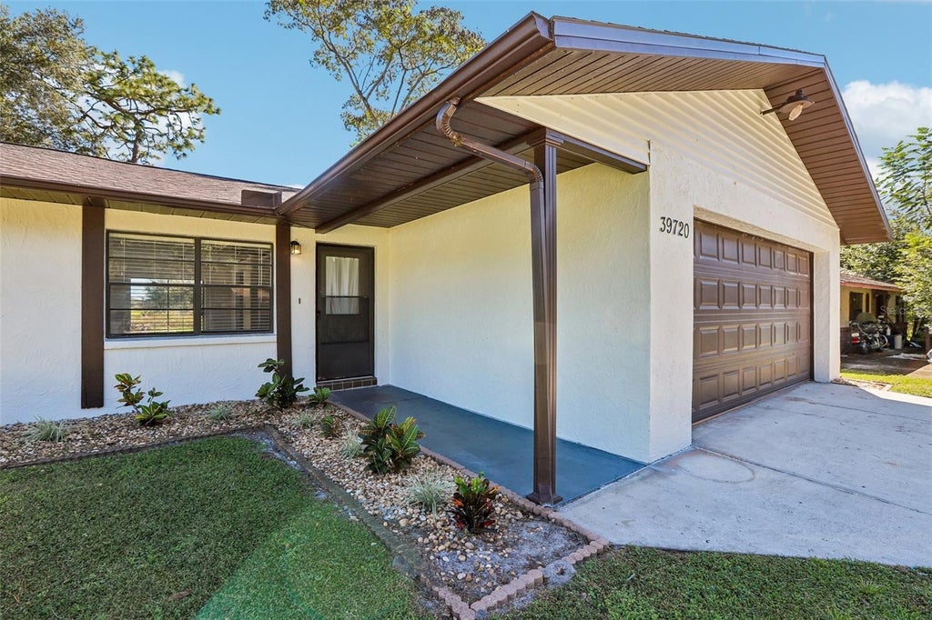 Photo of 39720 Meadowood Loop, Zephyrhills, FL 33542 (MLS # TB8561057)