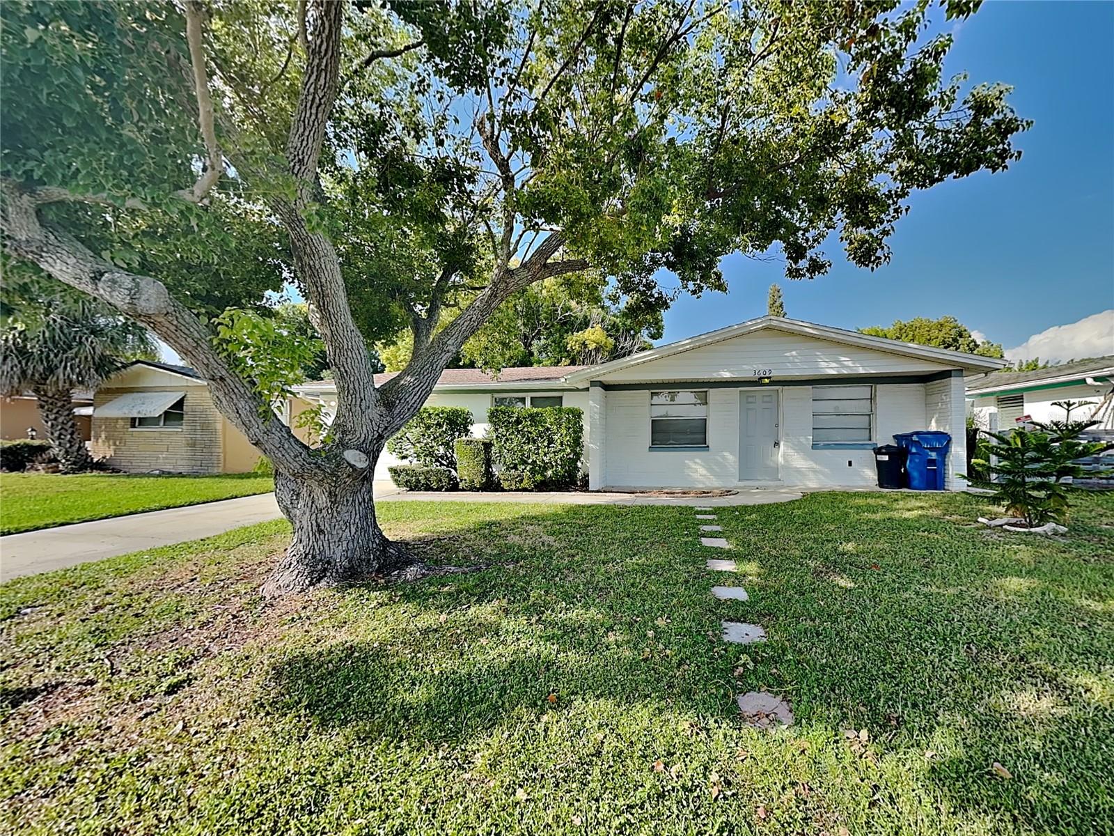 This beautifully maintained 3-bedroom, 2-bath home is perfect for first-time buyers looking for comfort, space, and affordability near Florida’s Gulf Coast. Located in the quiet Aloha Gardens neighborhood of Holiday, this home offers a great balance of convenience and relaxation — just minutes from beaches, shopping, and dining.
Step inside to a bright, open floor plan with easy-to-maintain tile flooring throughout the main living areas. The spacious kitchen opens to the dining and living room, making it ideal for entertaining or family time. Each bedroom offers plenty of natural light and closet space, and the two full bathrooms provide functionality and privacy.
Outside, you’ll enjoy a large fenced backyard, perfect for pets, weekend barbecues, or simply relaxing in your own space. The home also features a one-car garage and no HOA, giving you the flexibility and freedom many first-time homeowners are looking for.