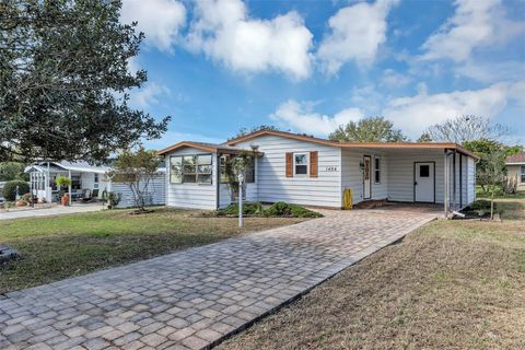 Photo of 1404 Plantation Drive, Lady Lake, FL 32159 (MLS # V4947429)