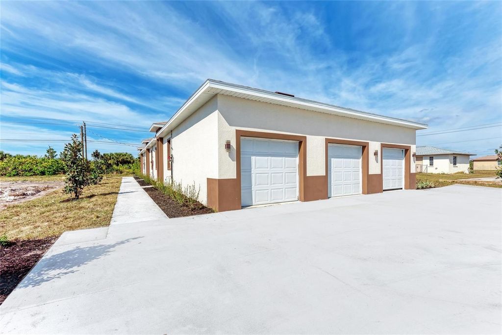 Photo of 289 Boundary Boulevard #202, Rotonda West, FL 33947 (MLS # A4658548)