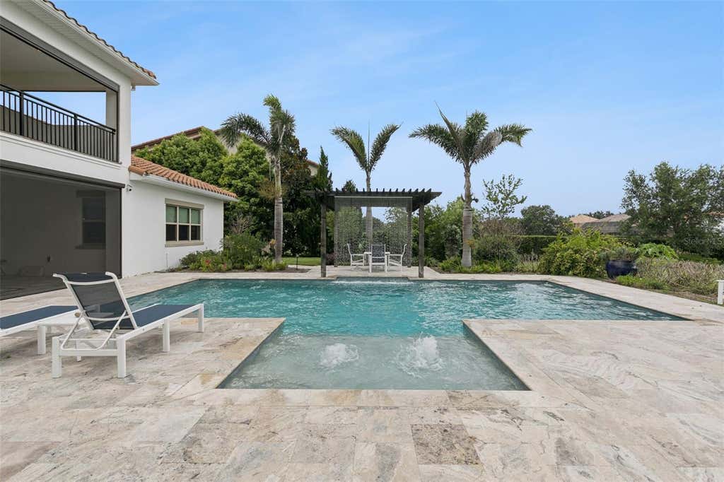 Photo of 10840 Mobberley Circle, Orlando, FL 32832 (MLS # O6434804)