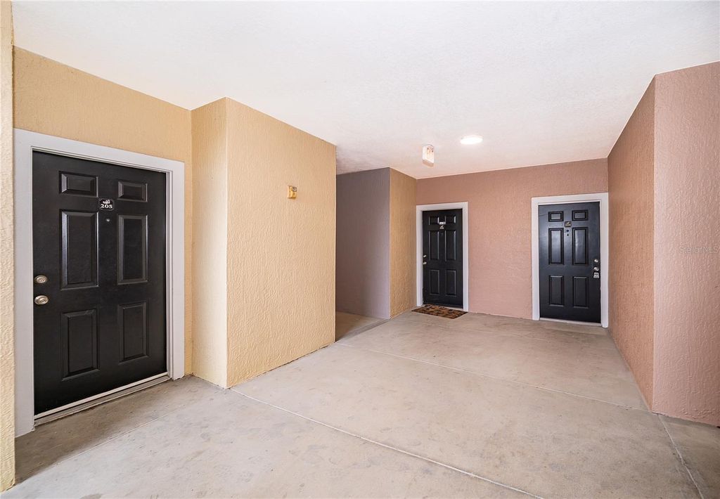 Photo of 6663 Queens Borough Avenue #208, Orlando, FL 32835 (MLS # O6397717)