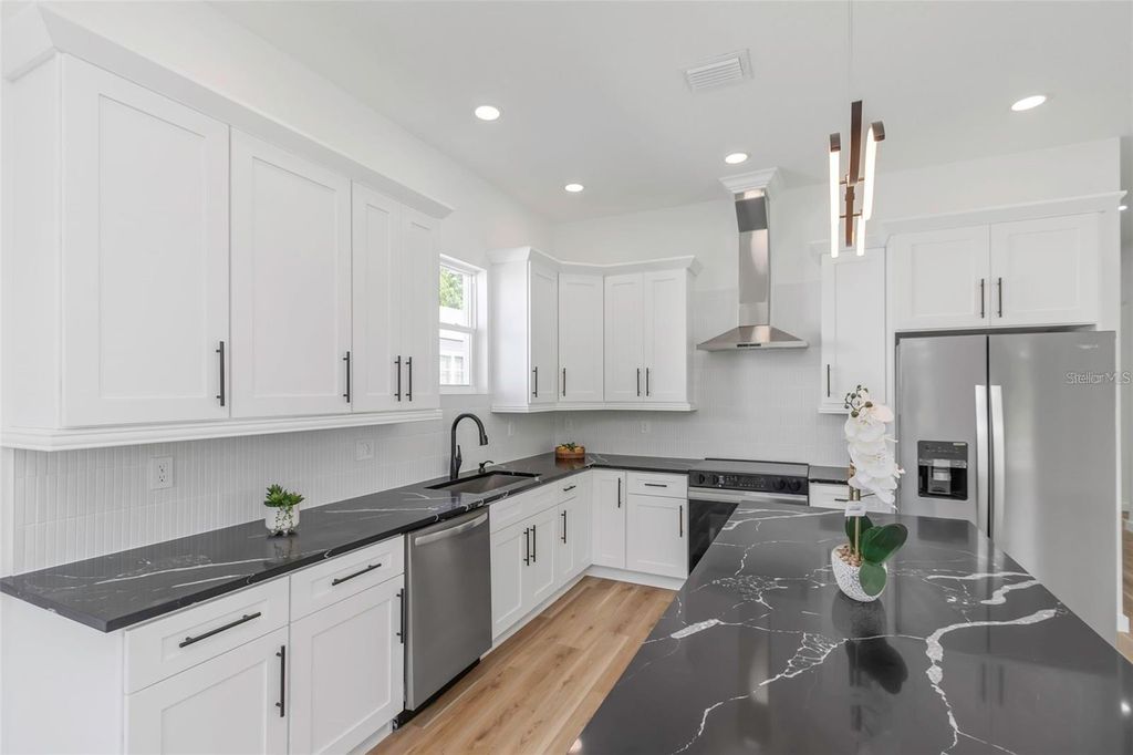 Photo of 711 42nd Avenue S, St Petersburg, FL 33705 (MLS # TB8449654)